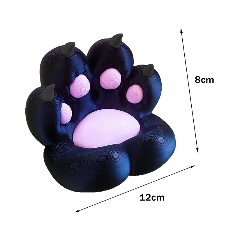 Black and pink cat paw ornament measuring 12cm by 8cm, featuring a textured 3D-printed design with soft pink pads.