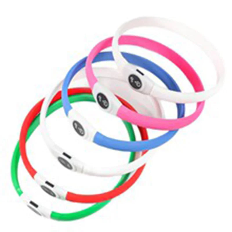 A set of colourful, waterproof LED dog collars in white, pink, blue, red and green with central power buttons.