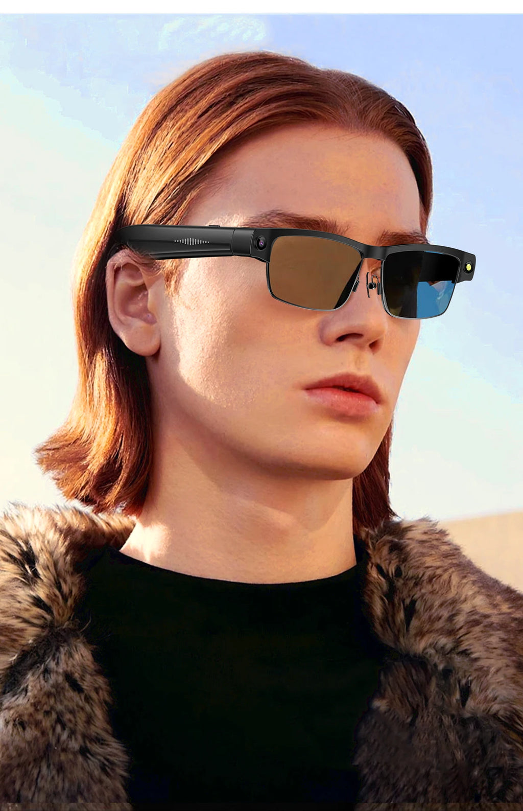 A model wearing sleek black smart camera glasses with a built-in lens, microphone sensor and tinted lenses.