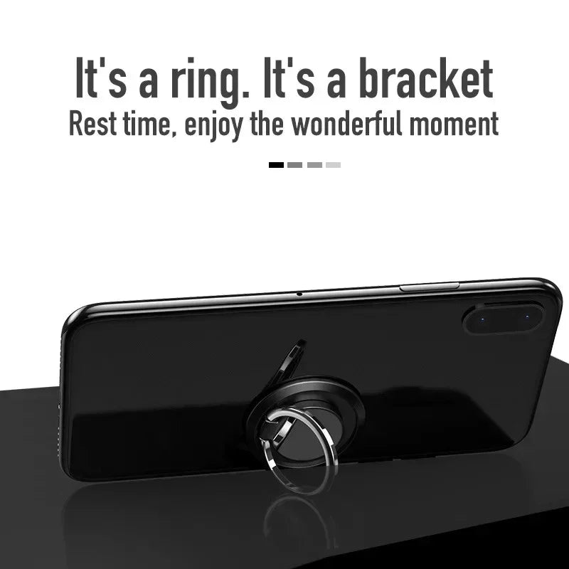 Black smartphone with a metallic, circular ring stand attached to the back, functioning as a phone grip and kickstand.