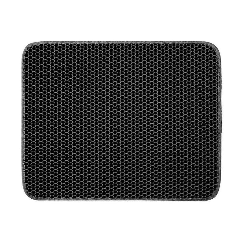 Large black rectangular cat litter trapping mat with a honeycomb texture design on a white background.