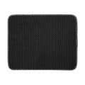 Large black rectangular cat litter trapping mat with a honeycomb texture design on a white background.