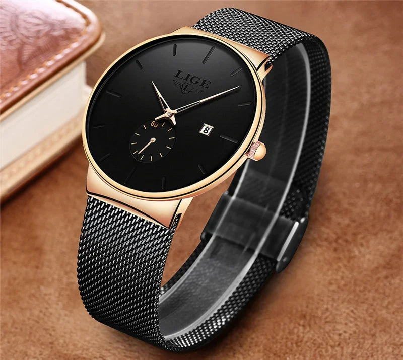 Elegant women's watch with a black face, rose-gold bezel, and slim black stainless steel mesh strap.