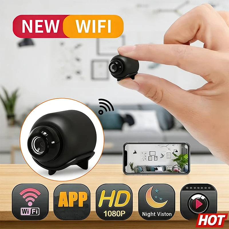A hand holds a tiny, black wireless security camera with 1080p HD, night vision, and app-controlled motion detection.