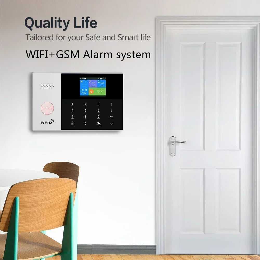 Sleek, white and black wall-mounted WiFi and GSM alarm panel with an SOS button, digital touchscreen, and RFID reader.