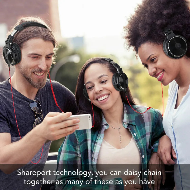 Three people wearing black wired over-ear studio headphones with distinct red cables while sharing a smartphone.