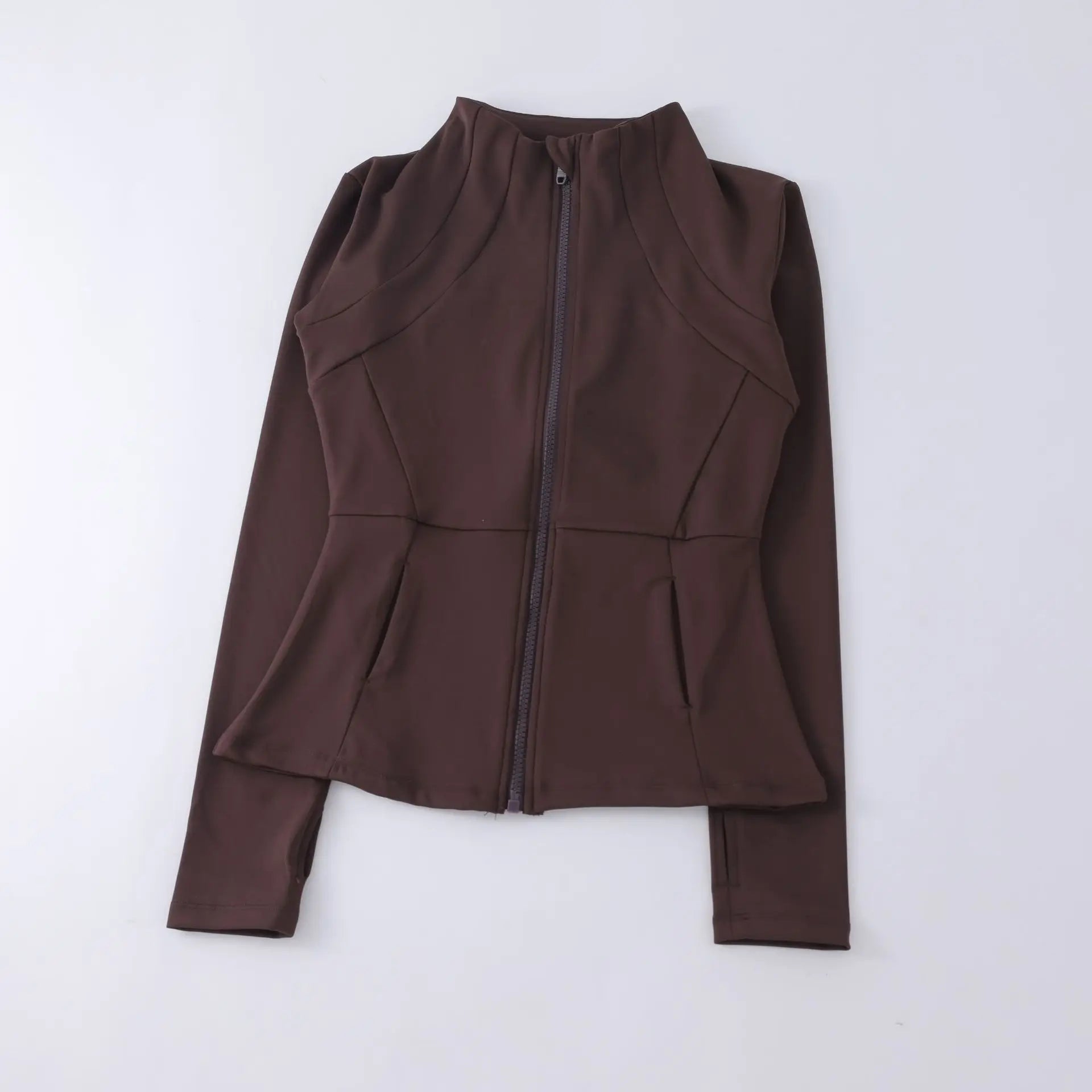 Dark brown zip-up sports jacket with a high neck, flattering seam detailing, and long sleeves on a plain background.
