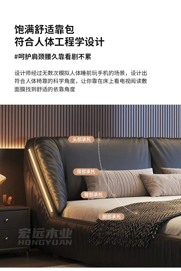 Modern king-size upholstered bed in dark grey with a cushioned, ergonomic headboard and integrated side lighting.