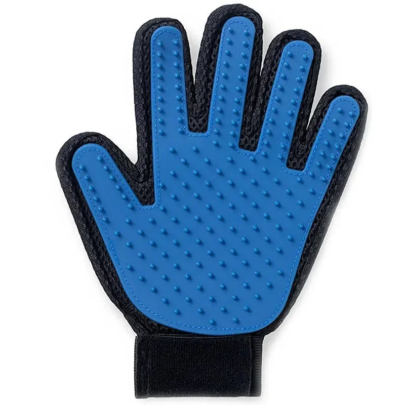 Blue pet grooming glove with rubber grooming nodules on a black mesh base, featuring an adjustable wrist strap.