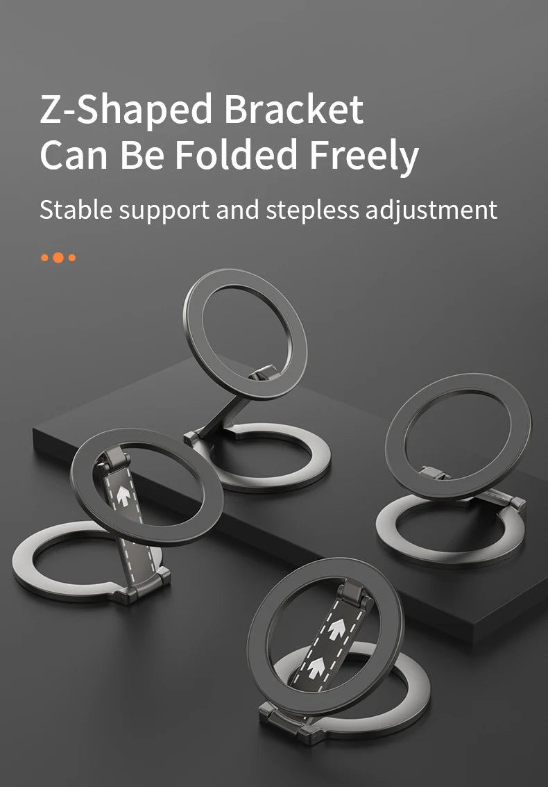 Three matte grey, circular Z-shaped folding phone stands shown from different angles on a dark surface.