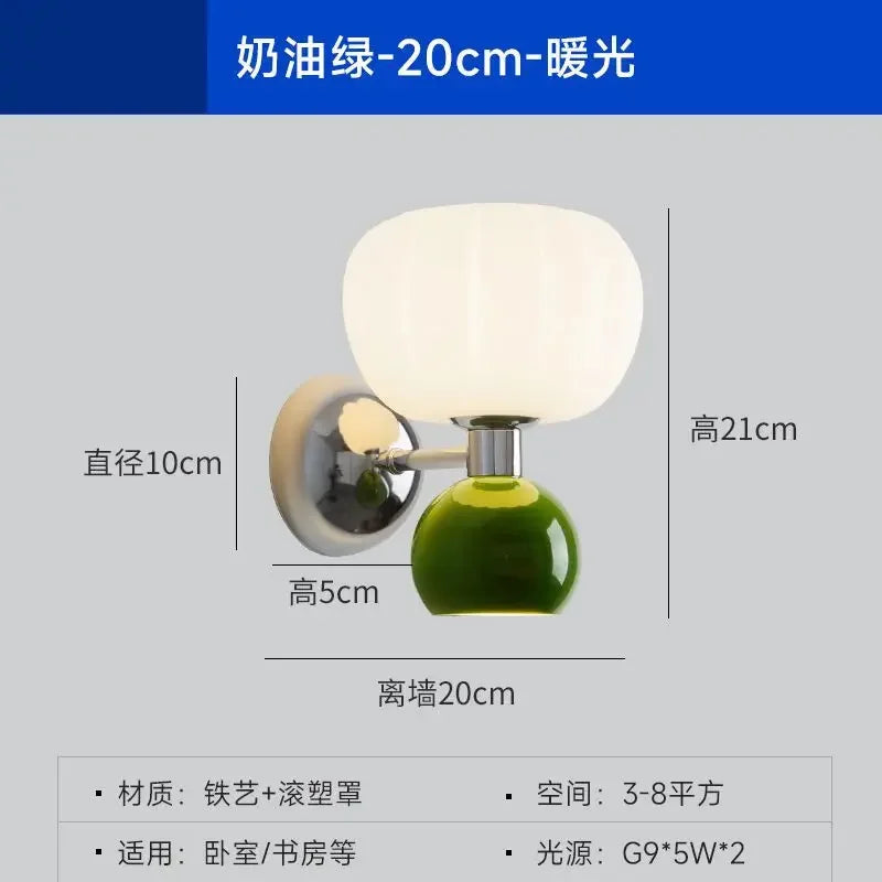 Cream-style wall lamp with a green base, chrome arm, and a globe-shaped white diffuser. Dimensions shown.