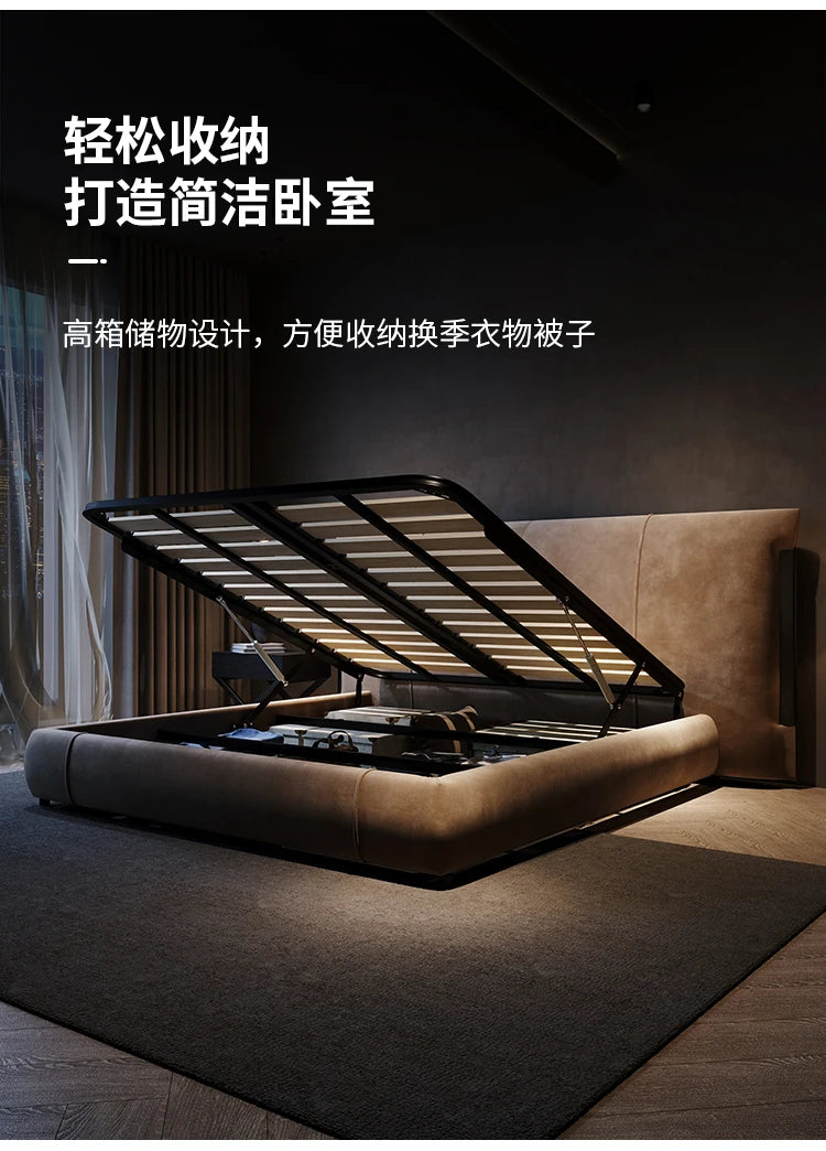 Taupe upholstered ottoman bed in a low-profile Nordic style with a lifting slatted base for hidden under-bed storage.