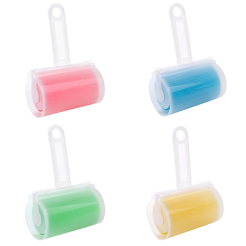 Four reusable, washable lint rollers with white handles and pink, blue, green, and yellow silicone rollers.