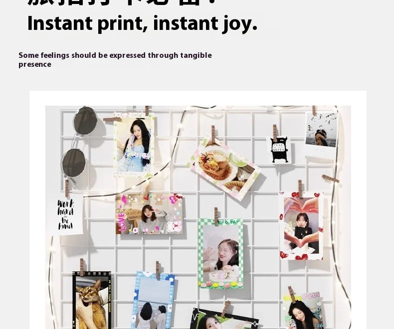 White metal grid wall panel with clips holding various photographs, a pair of sunglasses, and string lights.