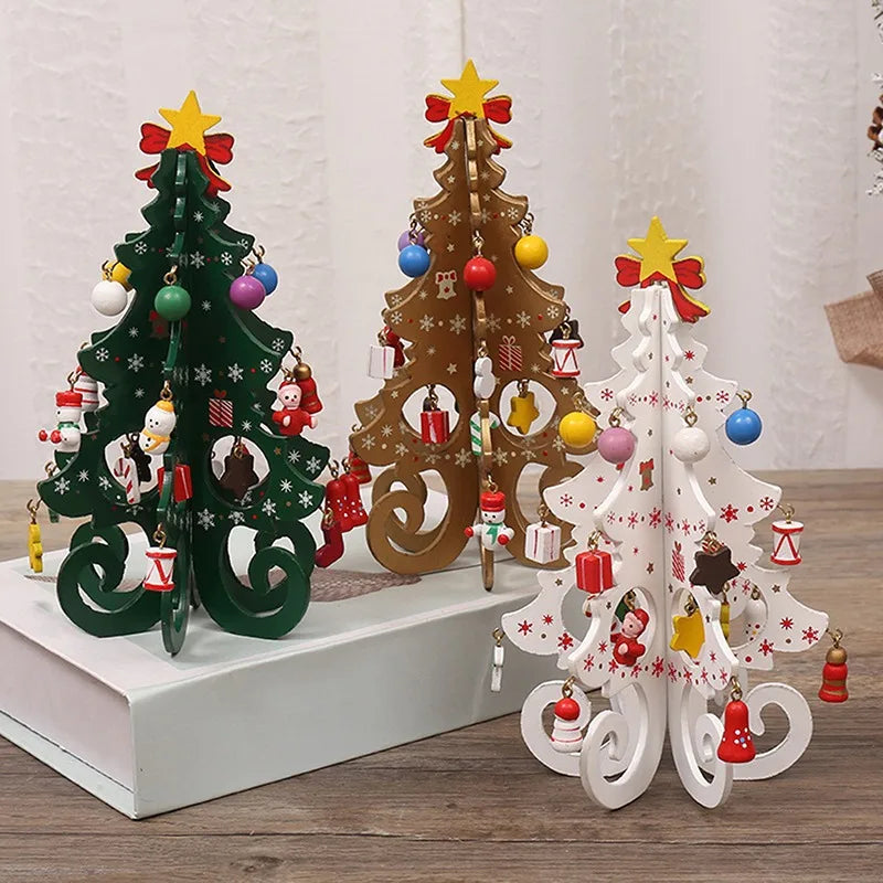 Three decorative wooden Christmas tree ornaments in green, gold, and white, adorned with hanging festive miniatures.