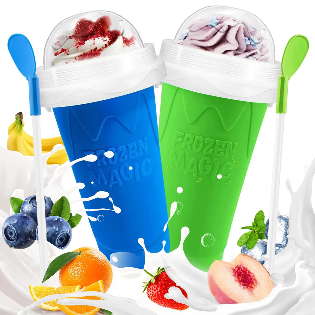 Two colourful slushy maker cups in blue and green, each with a dome lid, straw-spoon, and vibrant fruit decorations.