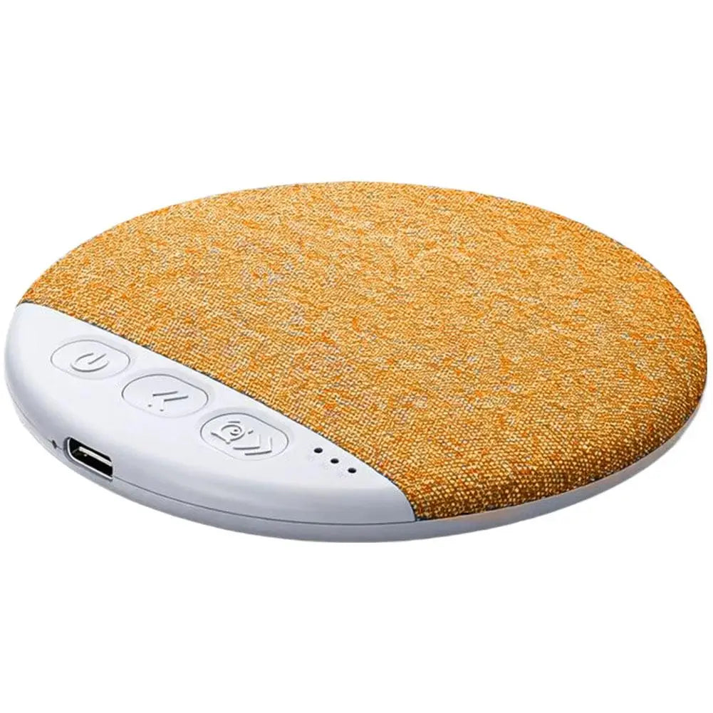 A round, yellow fabric-covered wireless under-pillow speaker with white control buttons and a charging port.