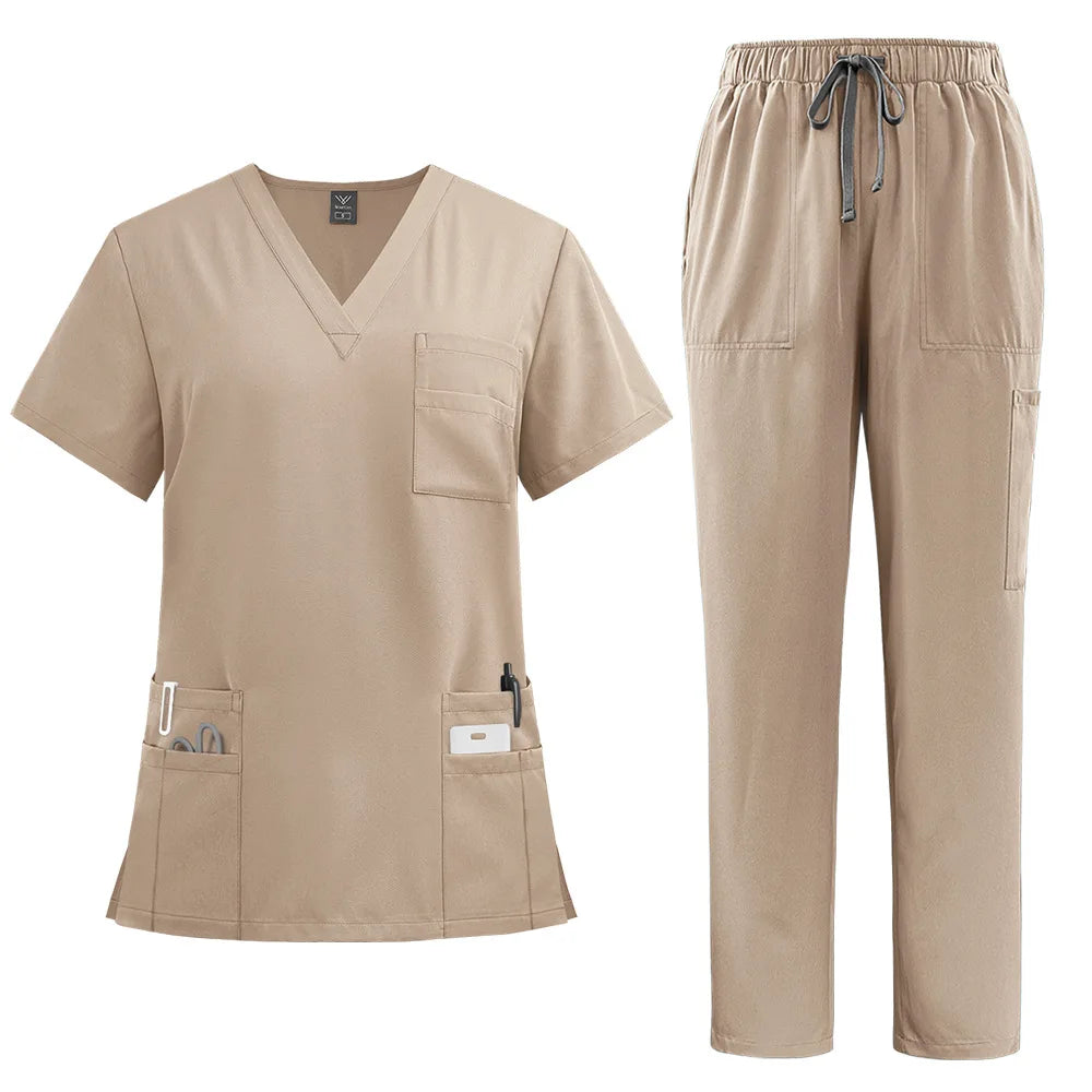 Beige nurse scrub set featuring a V-neck top with multiple pockets and matching elasticated drawstring trousers.