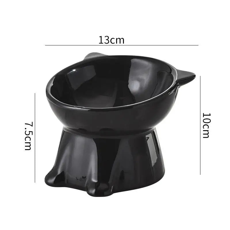 Black, cat-eared, ceramic tilted pet bowl on an elevated stand, with measurements indicating a 13cm diameter.