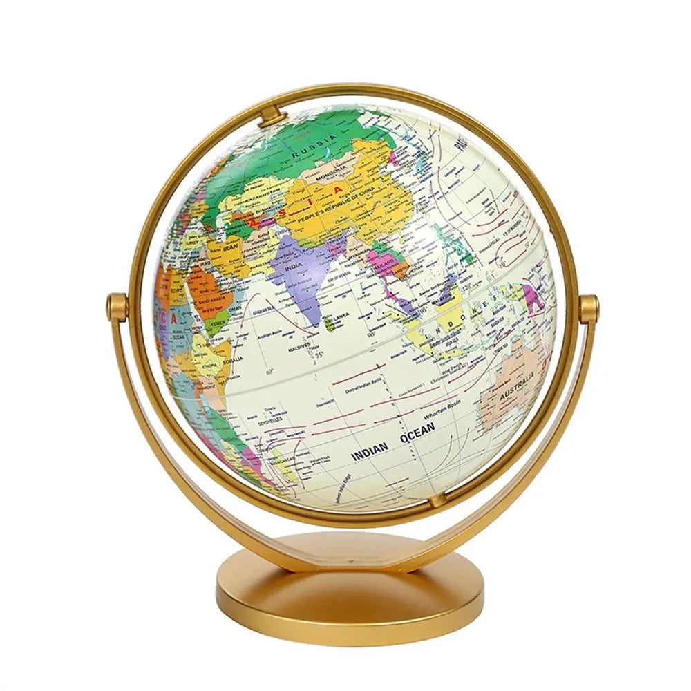 Decorative world globe with a vibrant, multi-coloured map, mounted on a sleek, minimalist gold-tone rotating stand.