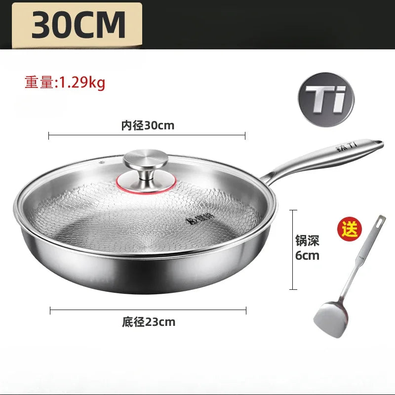 A 30cm titanium frying pan with a glass lid and spatula, featuring size and weight specifications.
