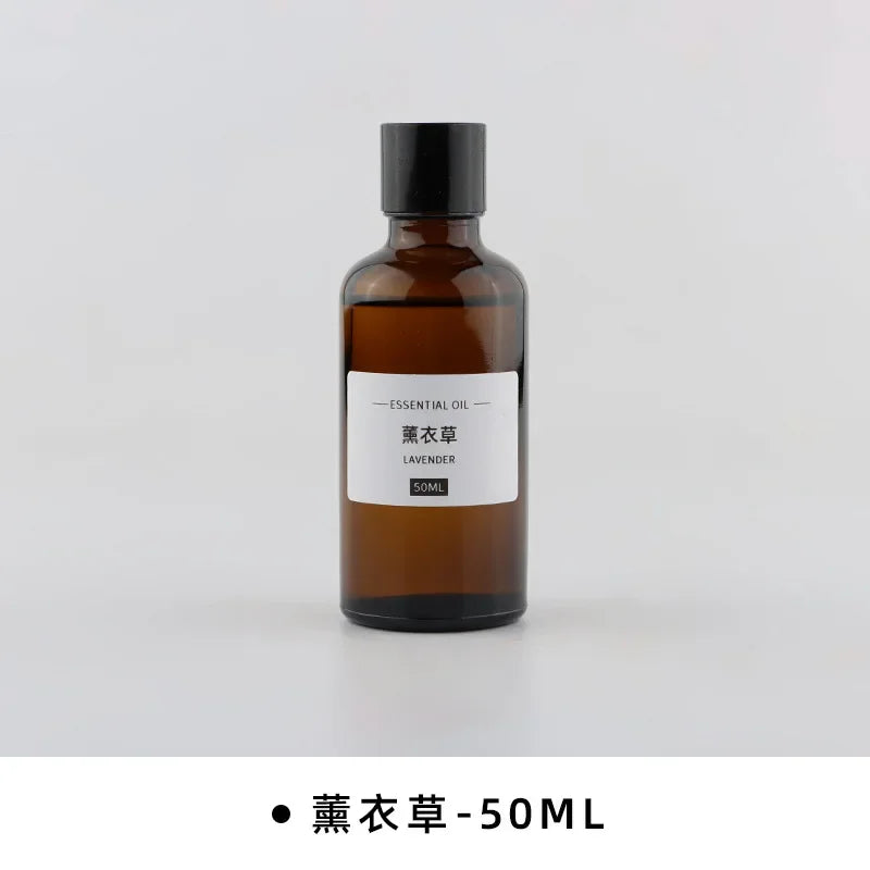 50ml bottle of amber glass essential oil with a minimalist white label, black screw cap, and lavender fragrance.