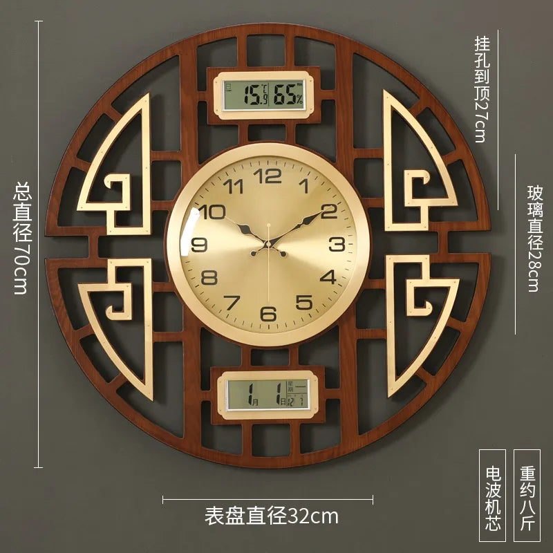 Decorative round wall clock with a dark wood-effect frame, gold face, and integrated digital temperature display.