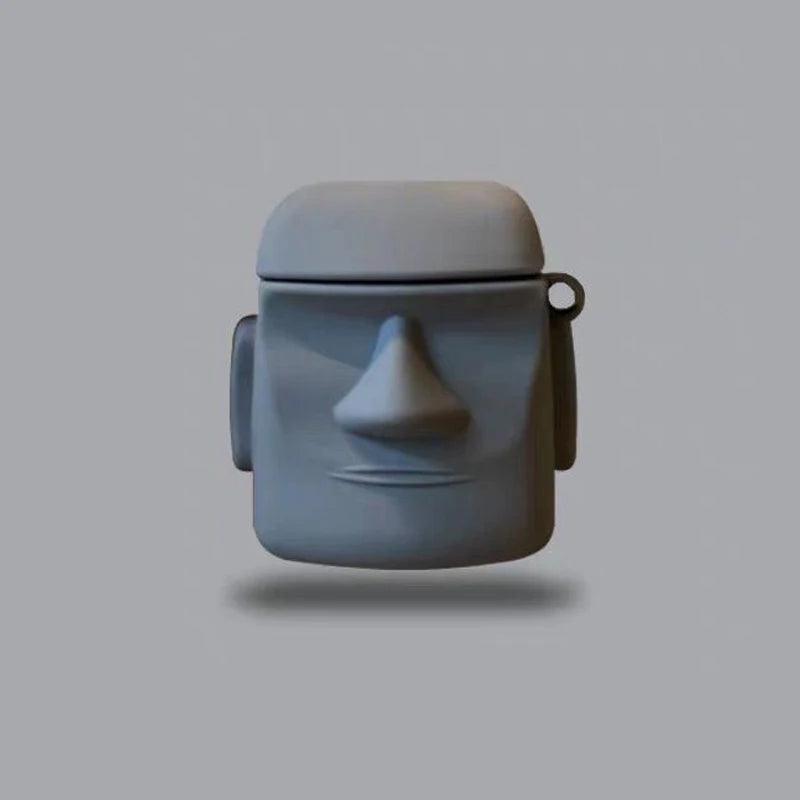 Grey silicone AirPods case shaped like an Easter Island Moai head. Suitable for standard AirPods.