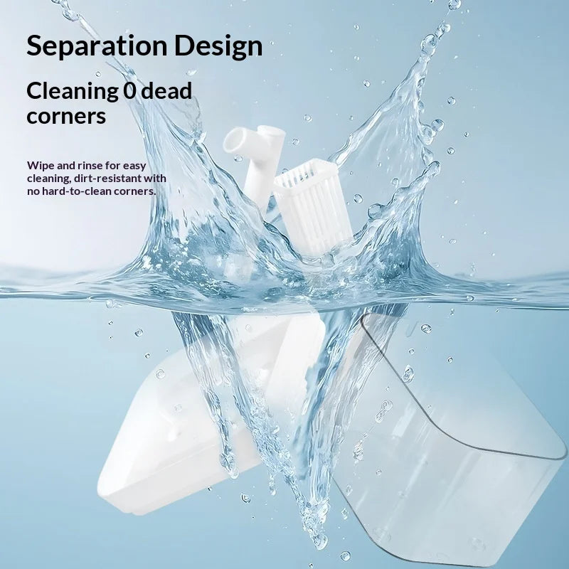 White pet fountain components shown being cleaned in water, highlighting the easy-to-clean, simple design.