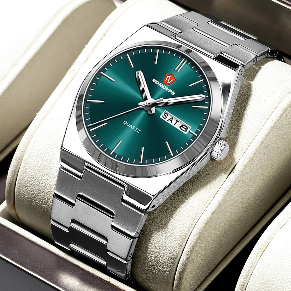 Ultra-thin silver-toned quartz watch with a sunray green dial, day-date window, and brushed stainless steel strap.