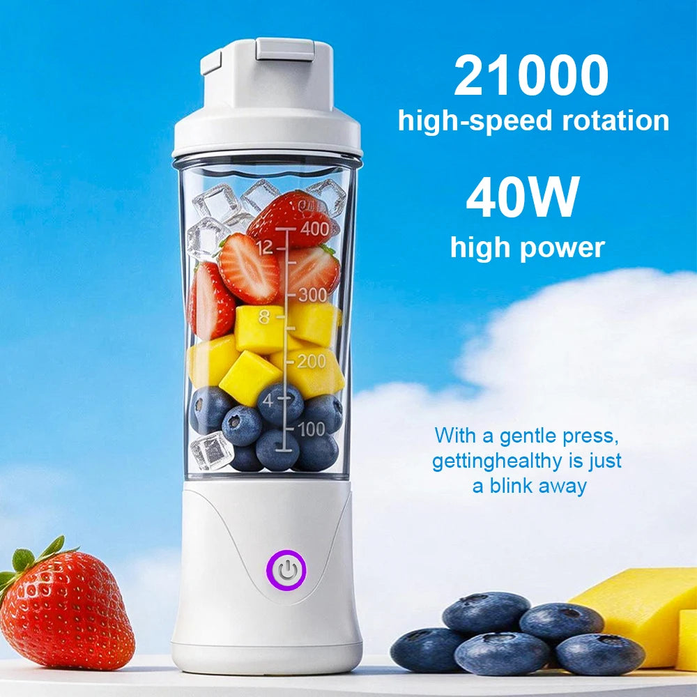 Portable white blender filled with strawberries, mango, and blueberries against a blue sky background.