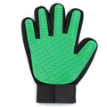 Bright green pet grooming glove with rubberised nubs and a black adjustable wrist strap.