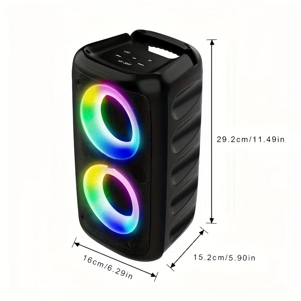 Portable black karaoke speaker with dual LED light rings, top handle, and dimension labels.