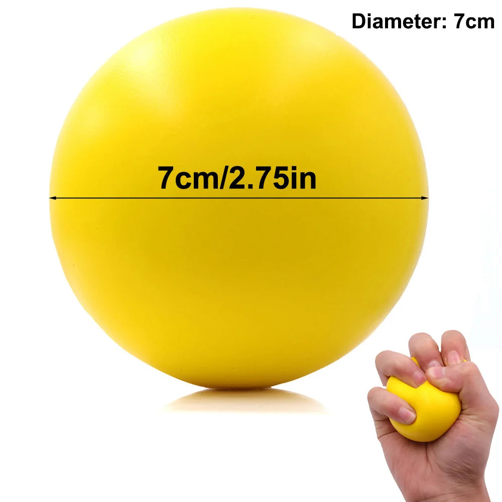 A bright yellow 7cm stress ball, shown full-size and being squeezed by a hand for scale against a white background.