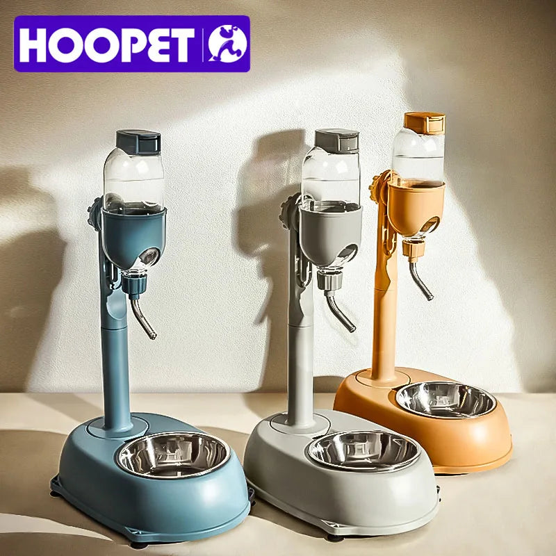 Three HOOPET automatic pet dispensers in blue, grey, and yellow with hanging water bottles and stainless steel bowls.