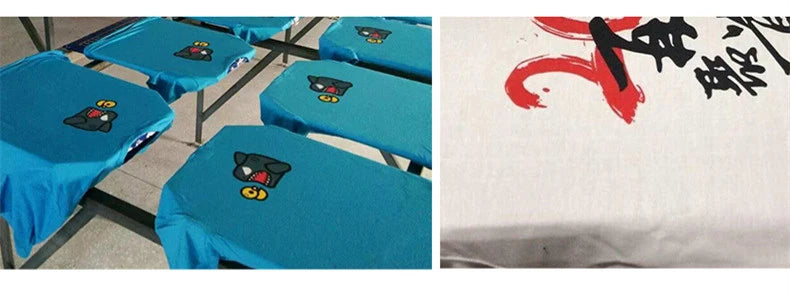 Blue polo shirts with small embroidered character logos laid out for printing, alongside white shirts with red and black.