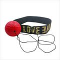 Red boxing reflex ball attached to a black headband with gold "LOVE" text.