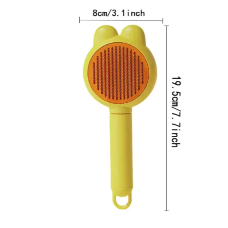 Yellow pet grooming brush with cute bear ears and an orange bristle pad, featuring annotated size dimensions.