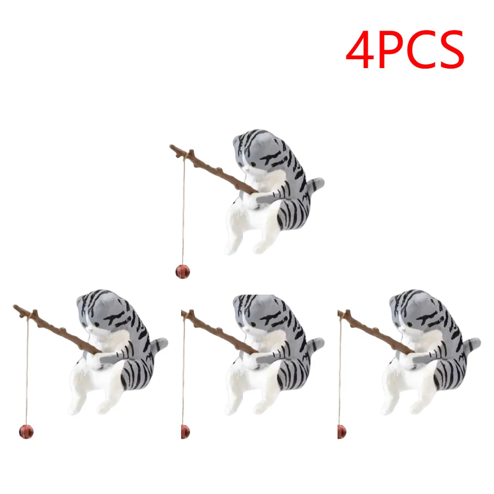 A set of four cute, grey and white tabby cat ornaments, each holding a small wooden fishing rod with a hanging bauble.