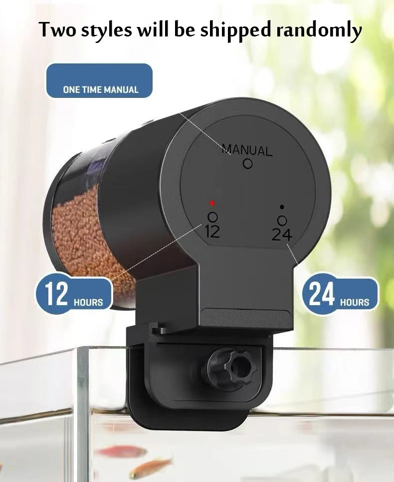 Black automatic fish feeder with clear food container, manual setting, and 12/24-hour interval options.