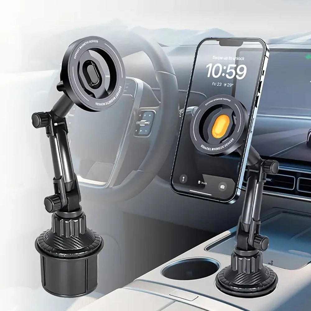 Black adjustable car cup holder phone mount with a magnetic circular head, shown in a modern vehicle interior.