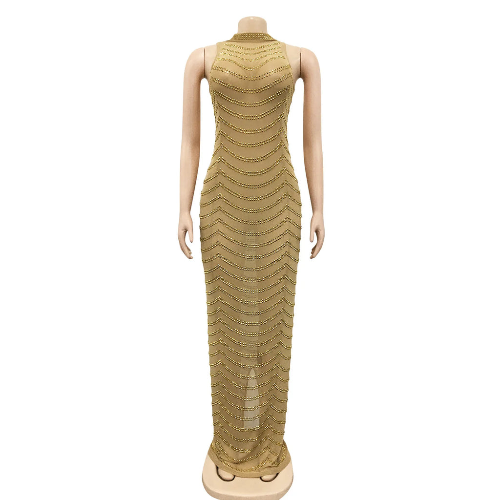 Gold sleeveless sheer maxi dress with high neckline and wavy beaded patterns on a mannequin.