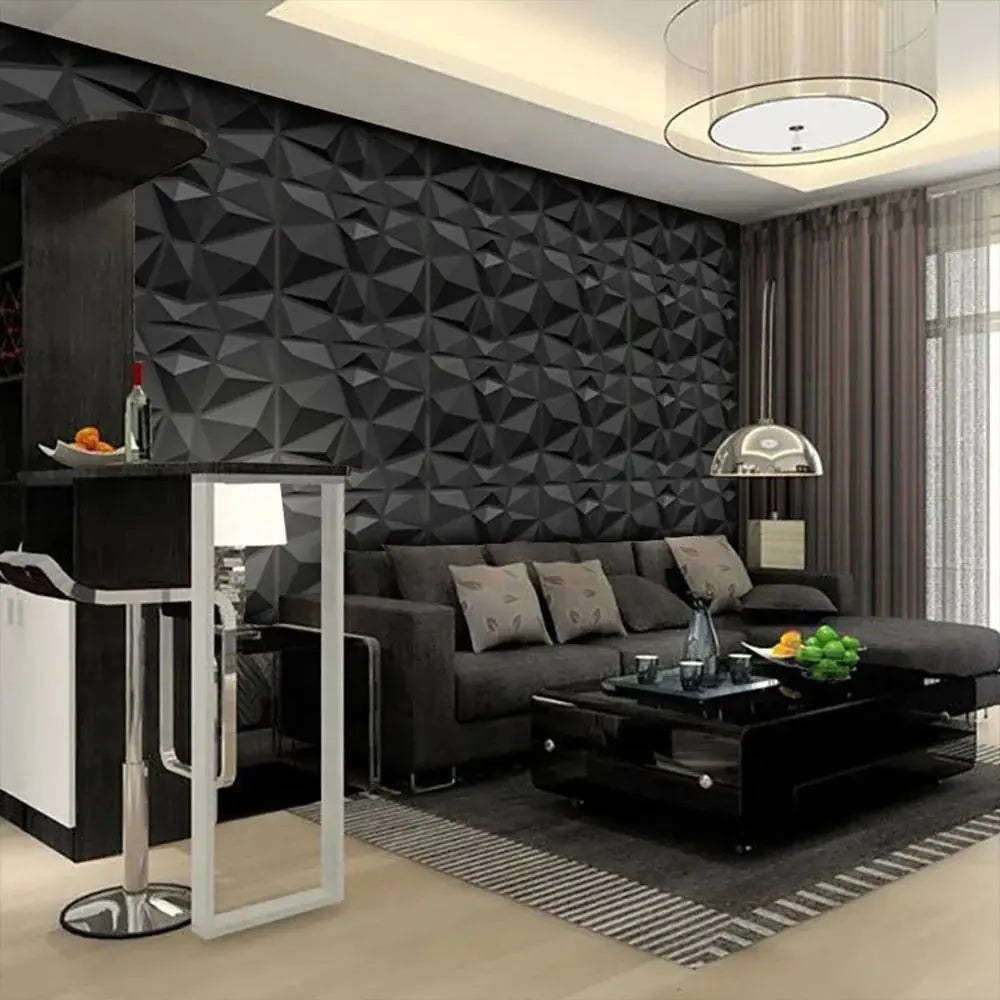 Modern living room featuring matte black 3D diamond-patterned waterproof wall tiles behind a contemporary sofa.