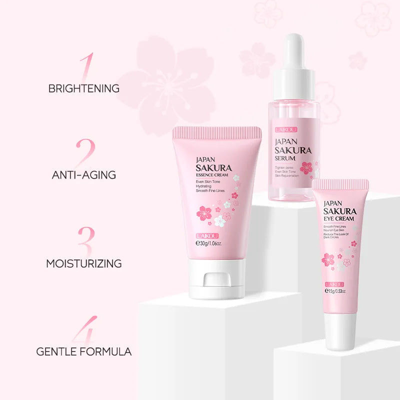 Skincare set with pink Sakura essence cream, serum, and eye cream for brightening, anti-aging, and moisturizing.