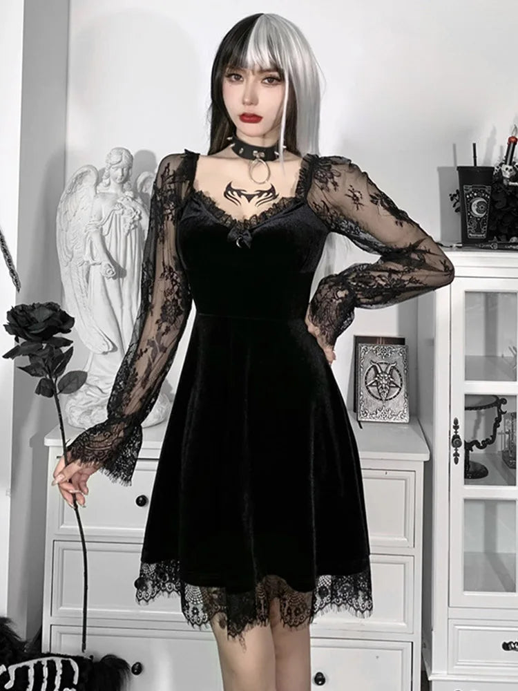 Black velvet mini A-line dress with sheer lace long sleeves, V-neck, and lace trim at the hem.