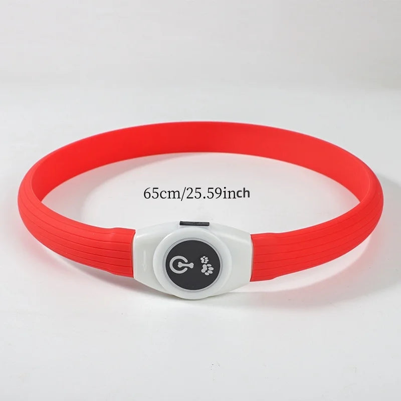 Bright red LED dog collar, 65cm long, featuring a white power button with paw print and bone icons.