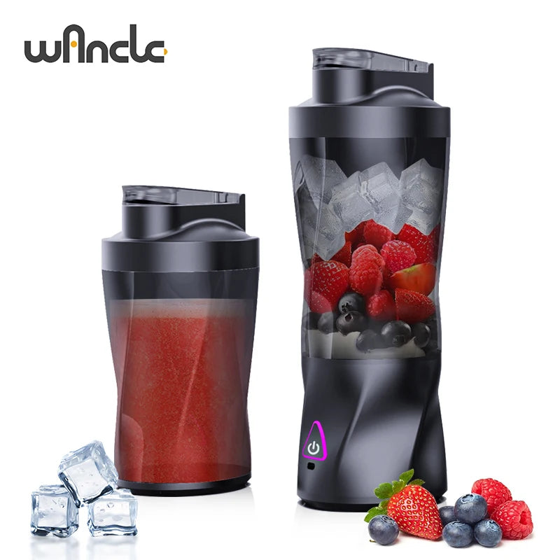 Black portable electric blender with berries and ice inside, featuring a sleek, modern design and power button.