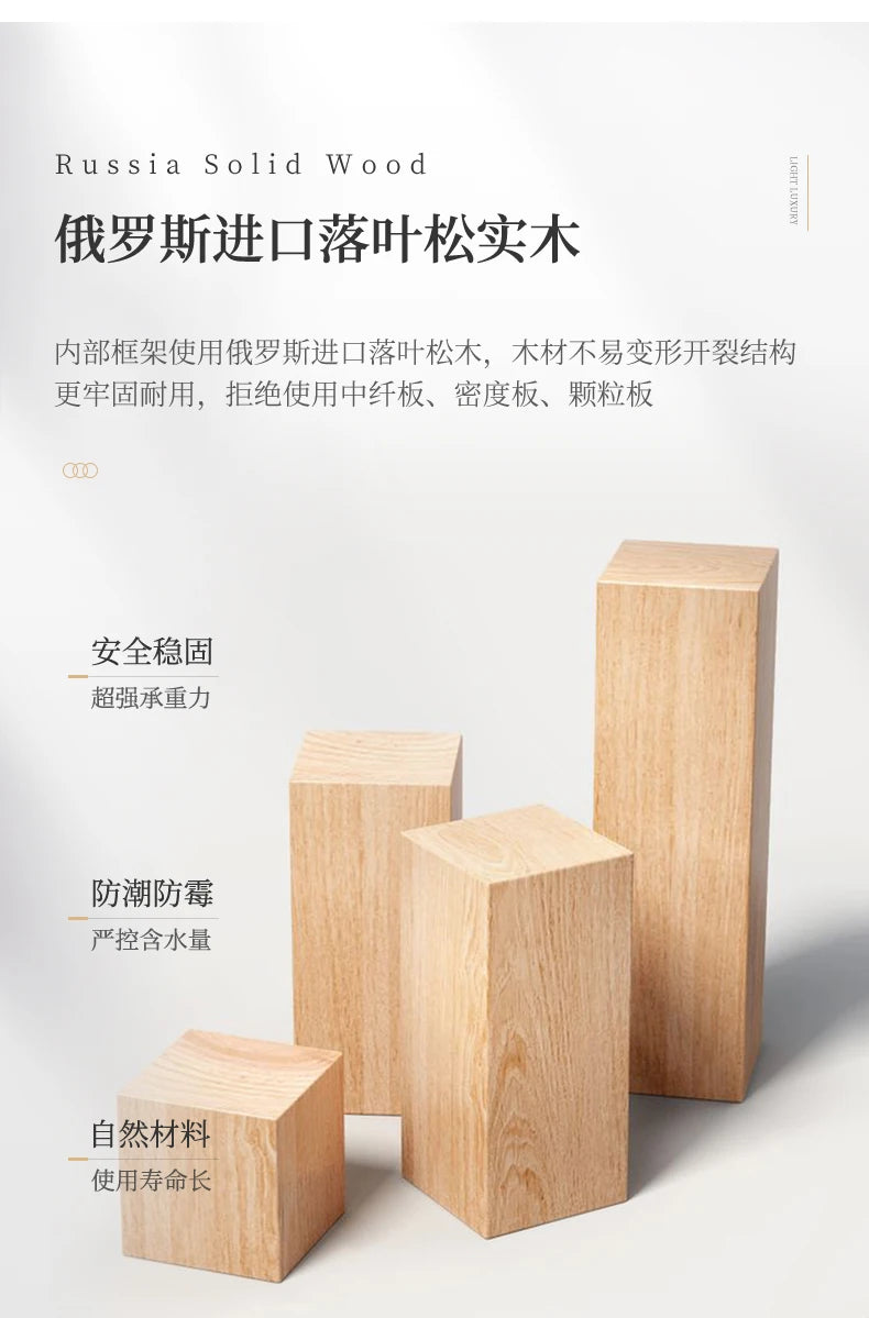 Four natural light-wood blocks of varying heights arranged together, showcasing solid wood grain texture.