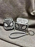 Clear Marvel Spider-Man hard case for AirPods Pro, featuring a silver braided wrist strap and web design.