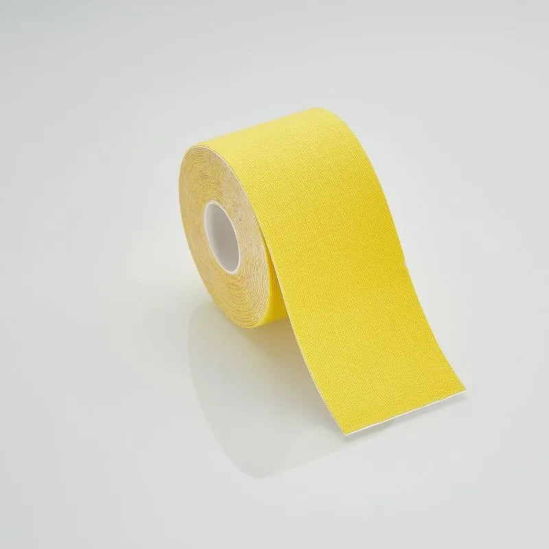 A single roll of bright yellow kinesiology sports tape, angled to show the fabric texture on a plain white background.